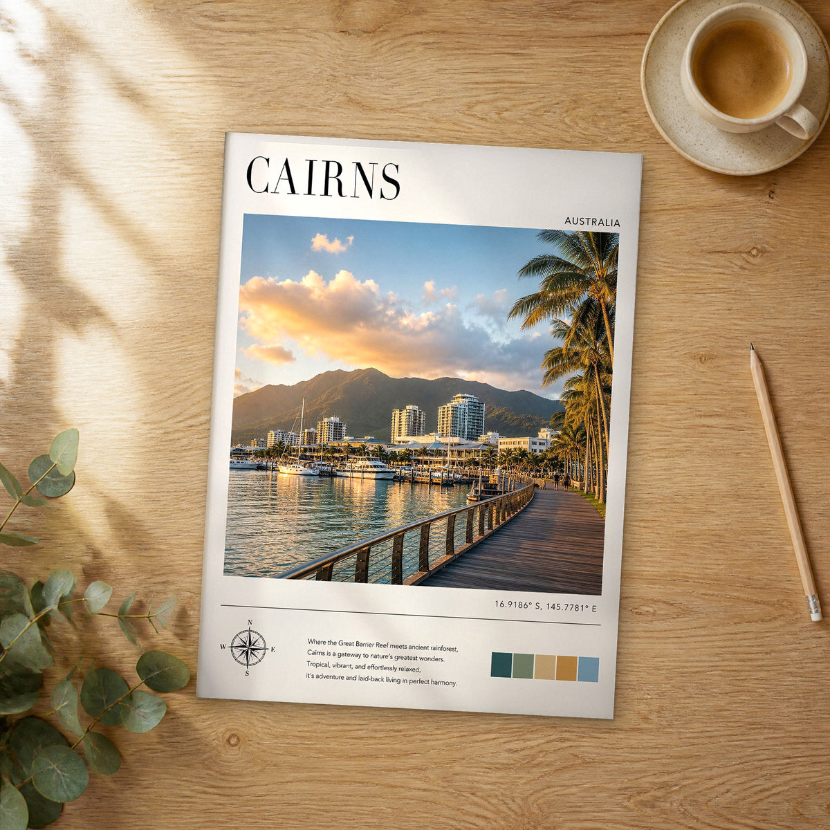 Unframed Cairns modern photography travel poster on a wooden table