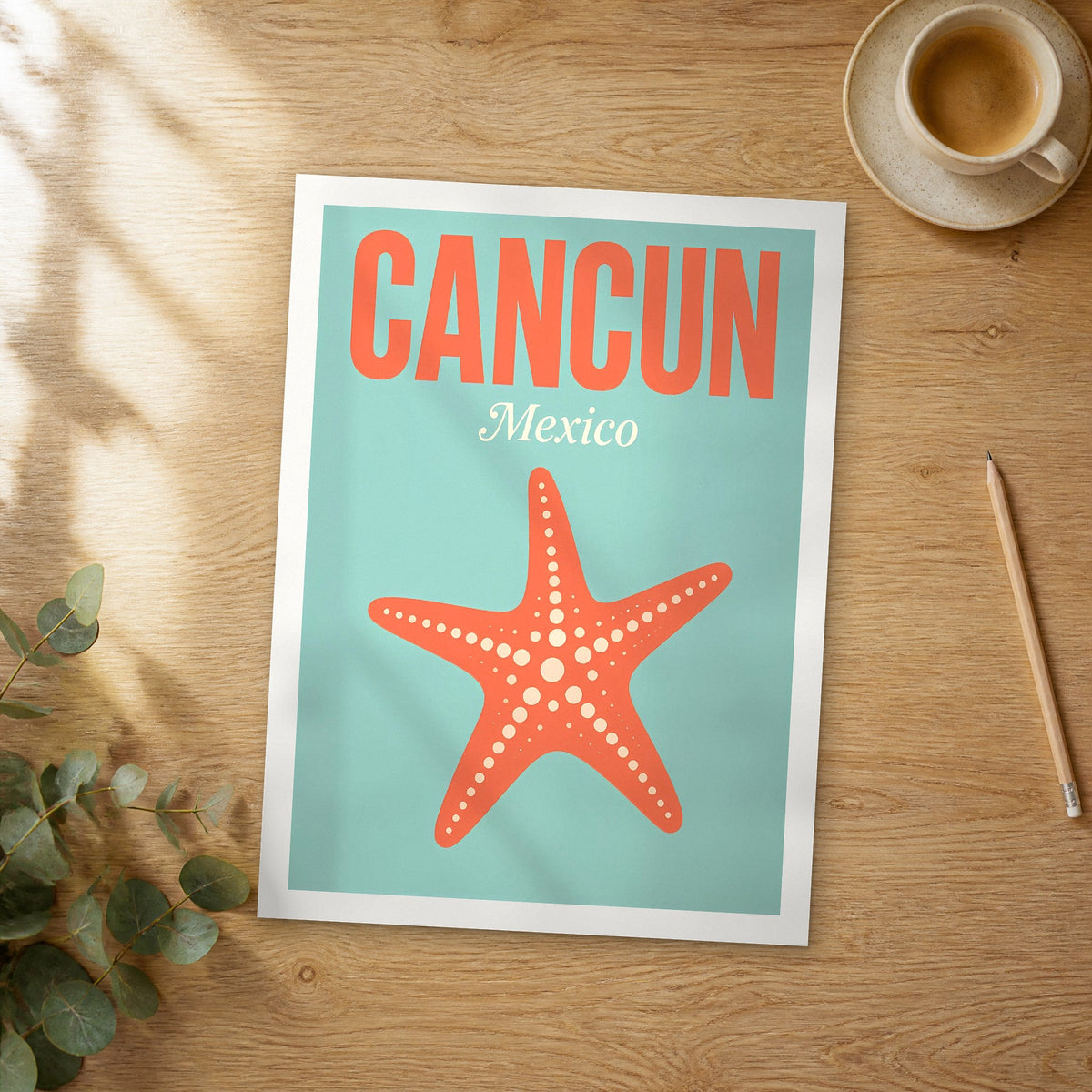 Unframed Cancun pop art travel poster on a wooden table