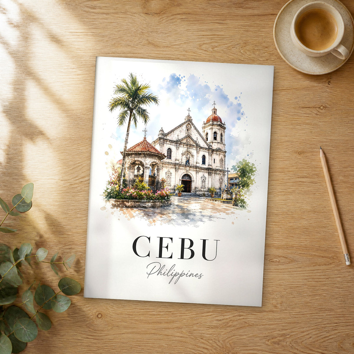Unframed Cebu watercolor travel poster on a wooden table