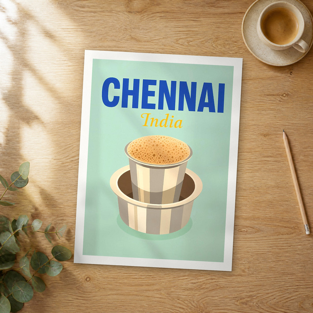 Unframed Chennai pop art travel poster on a wooden table