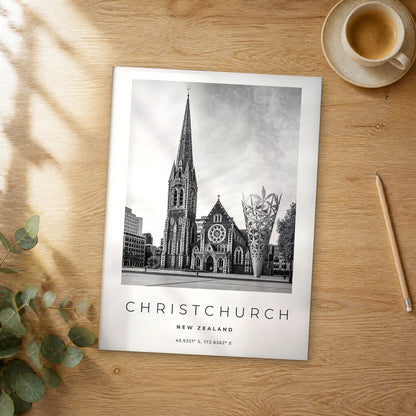 Unframed Christchurch black and white travel poster on a wooden table