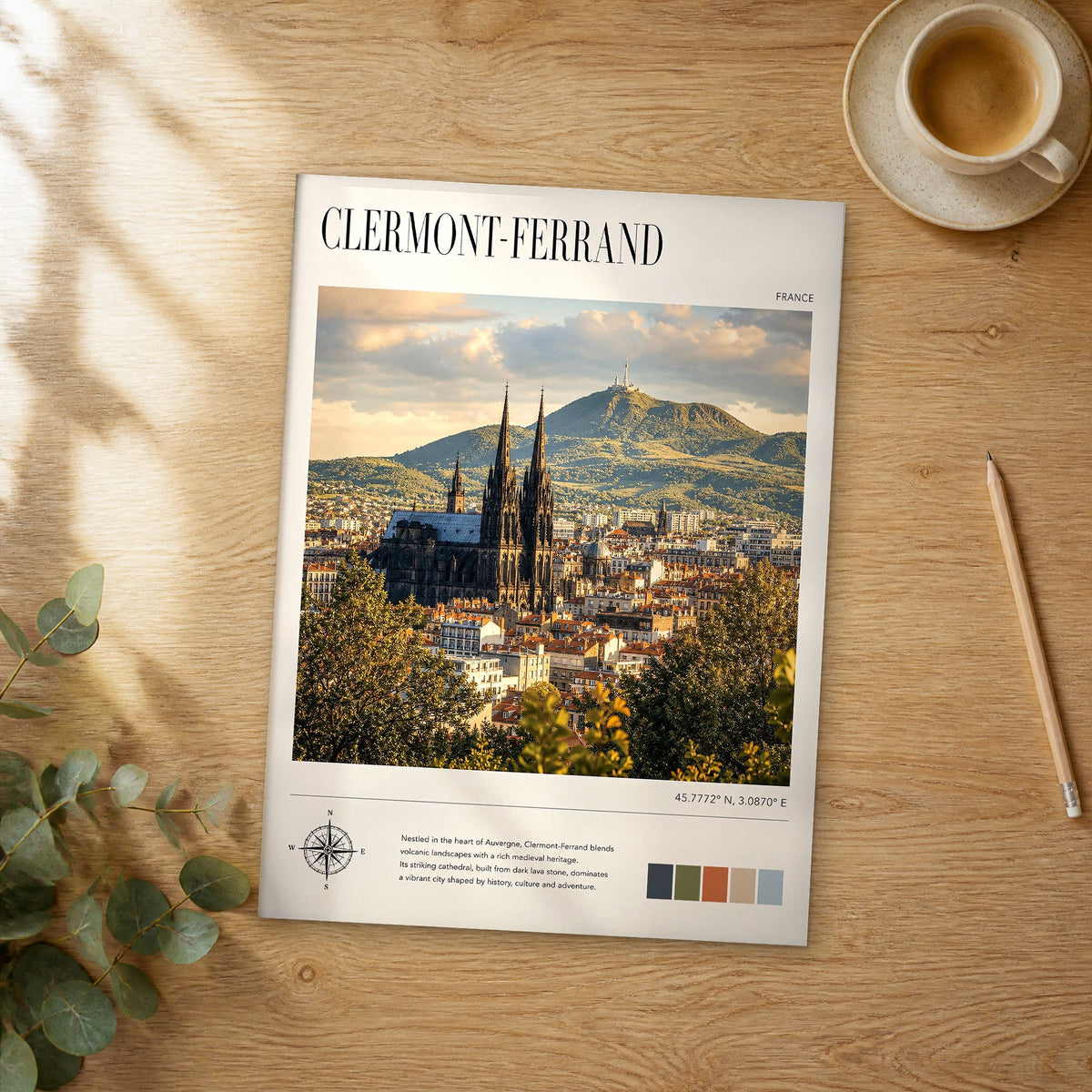 Unframed Clermont-Ferrand modern photography travel poster on a wooden table