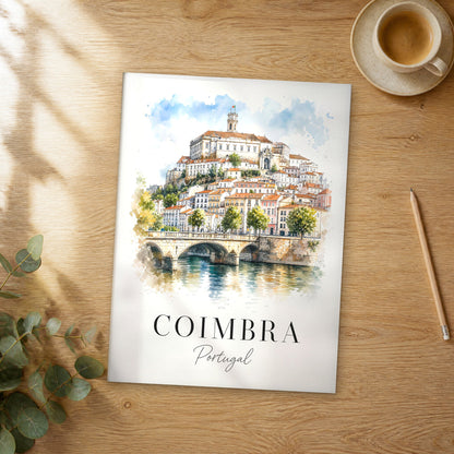 Unframed Coimbra watercolor travel poster on a wooden table