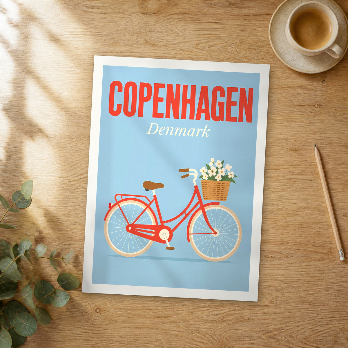 Unframed Copenhagen pop art travel poster on a wooden table