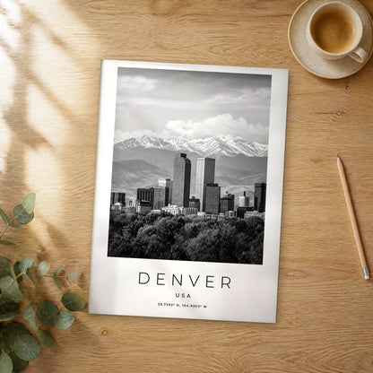 Unframed Denver black and white travel poster on a wooden table