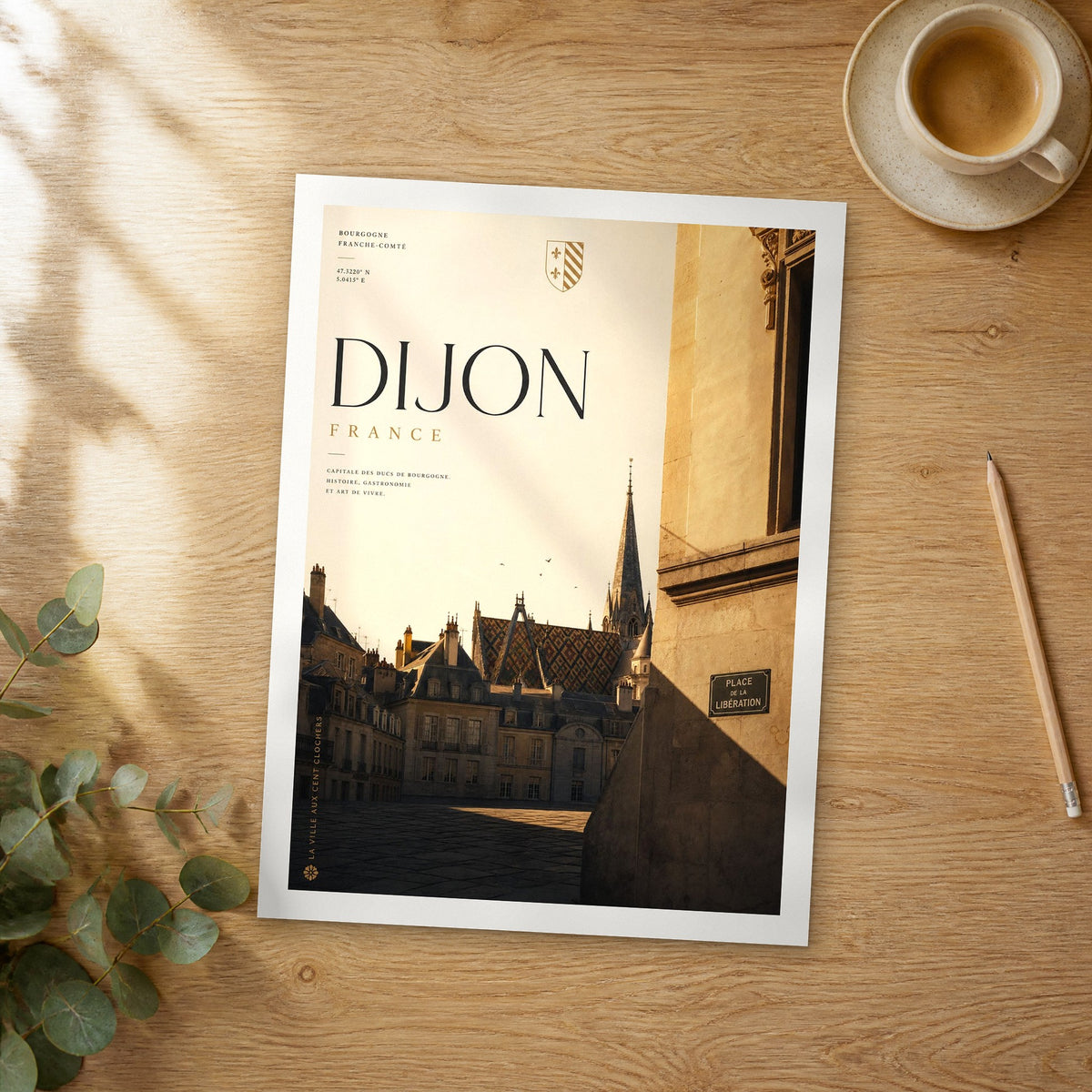 Unframed Dijon bold typography travel poster on a wooden table