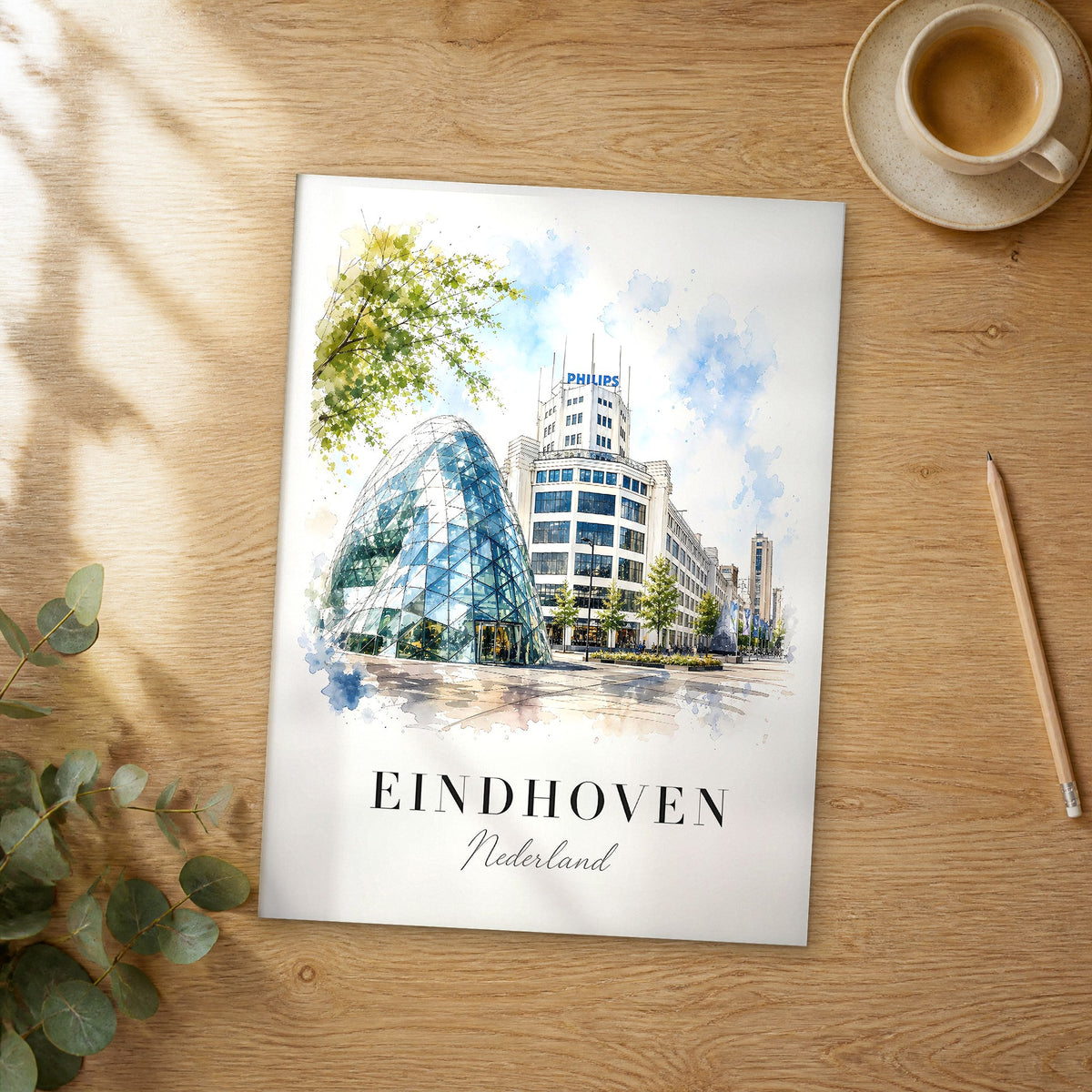Unframed Eindhoven watercolor travel poster on a wooden table