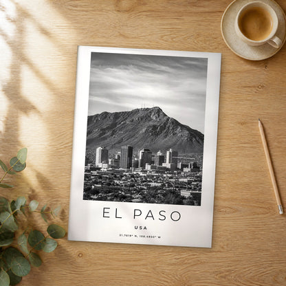 Unframed El Paso black and white travel poster on a wooden table