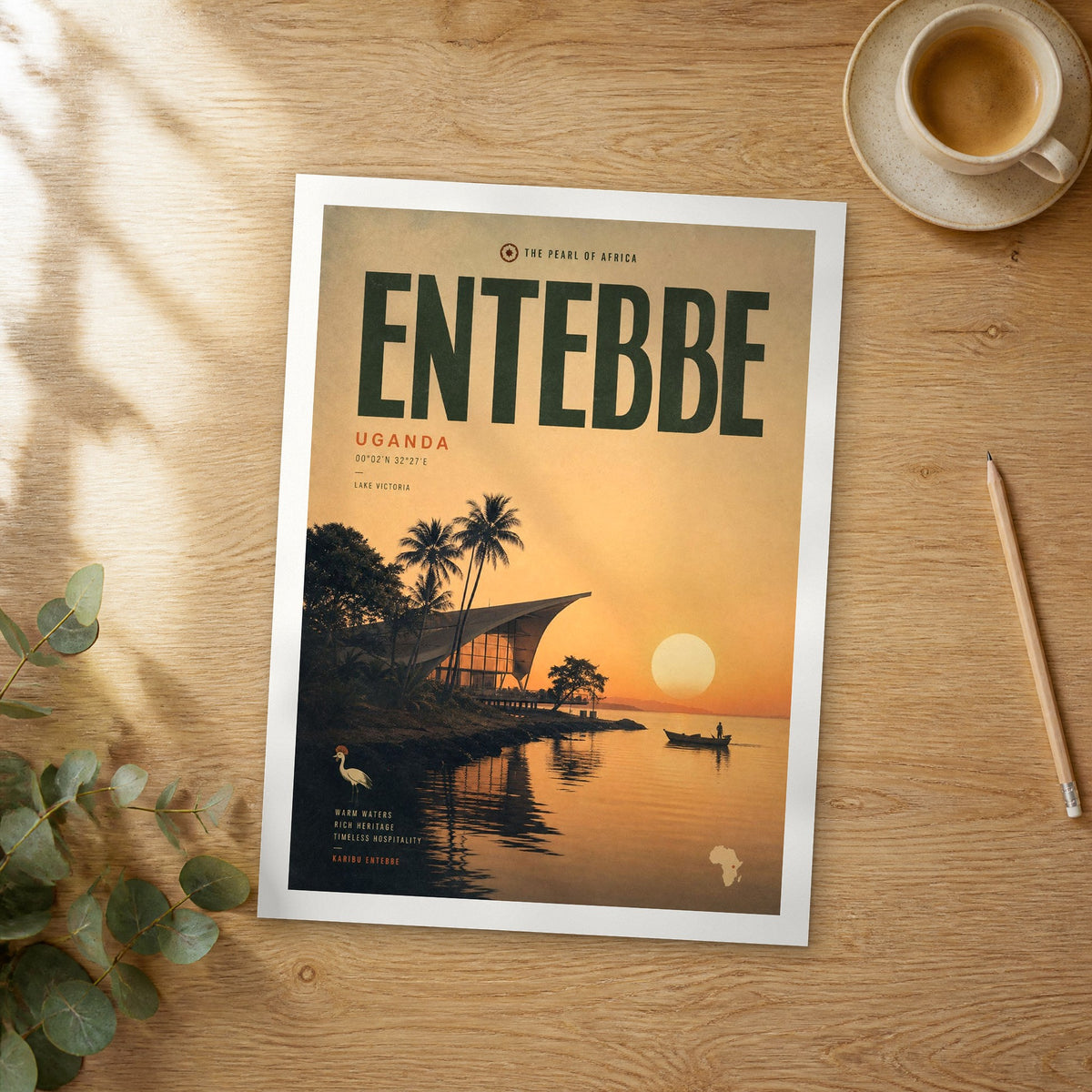 Unframed Entebbe bold typography travel poster on a wooden table