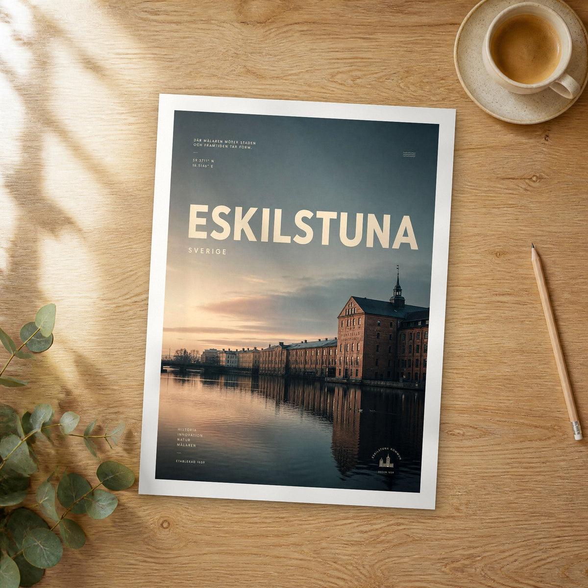Unframed Eskilstuna bold typography travel poster on a wooden table