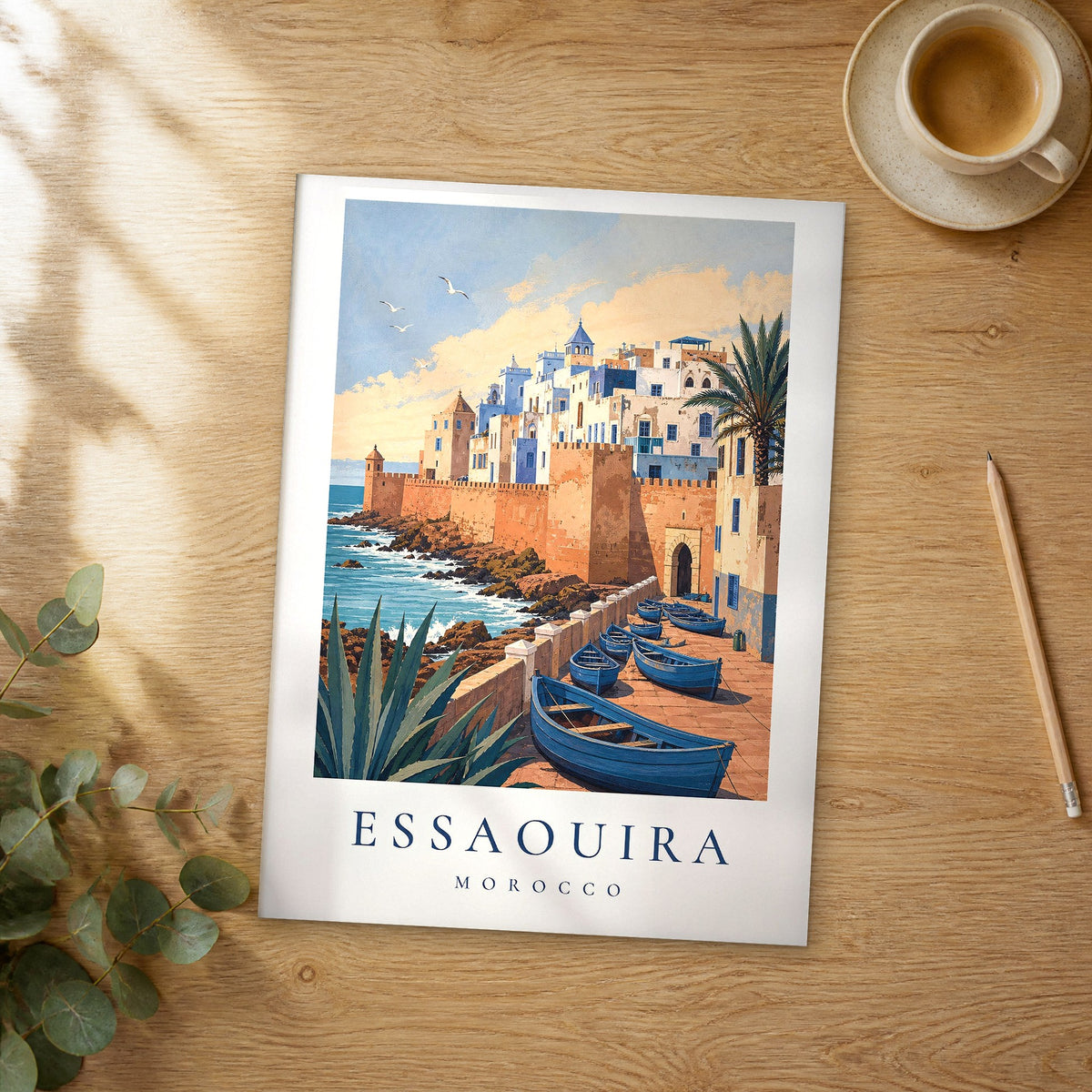 Unframed Essaouira vintage travel poster on a wooden table