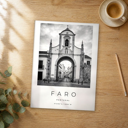 Unframed Faro black and white travel poster on a wooden table