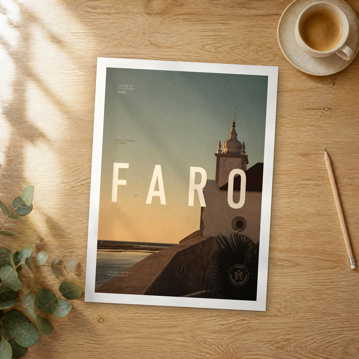 Unframed Faro bold typography travel poster on a wooden table