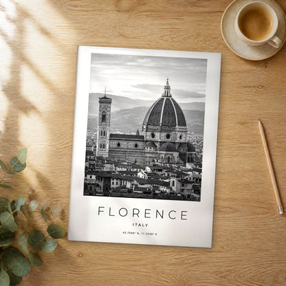 Unframed Florence black and white travel poster on a wooden table