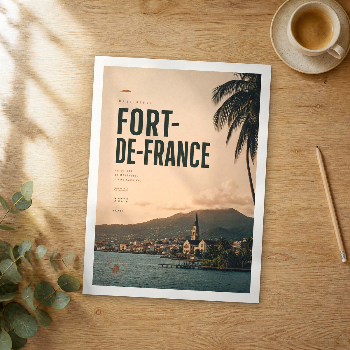 Unframed Fort-de-France bold typography travel poster on a wooden table