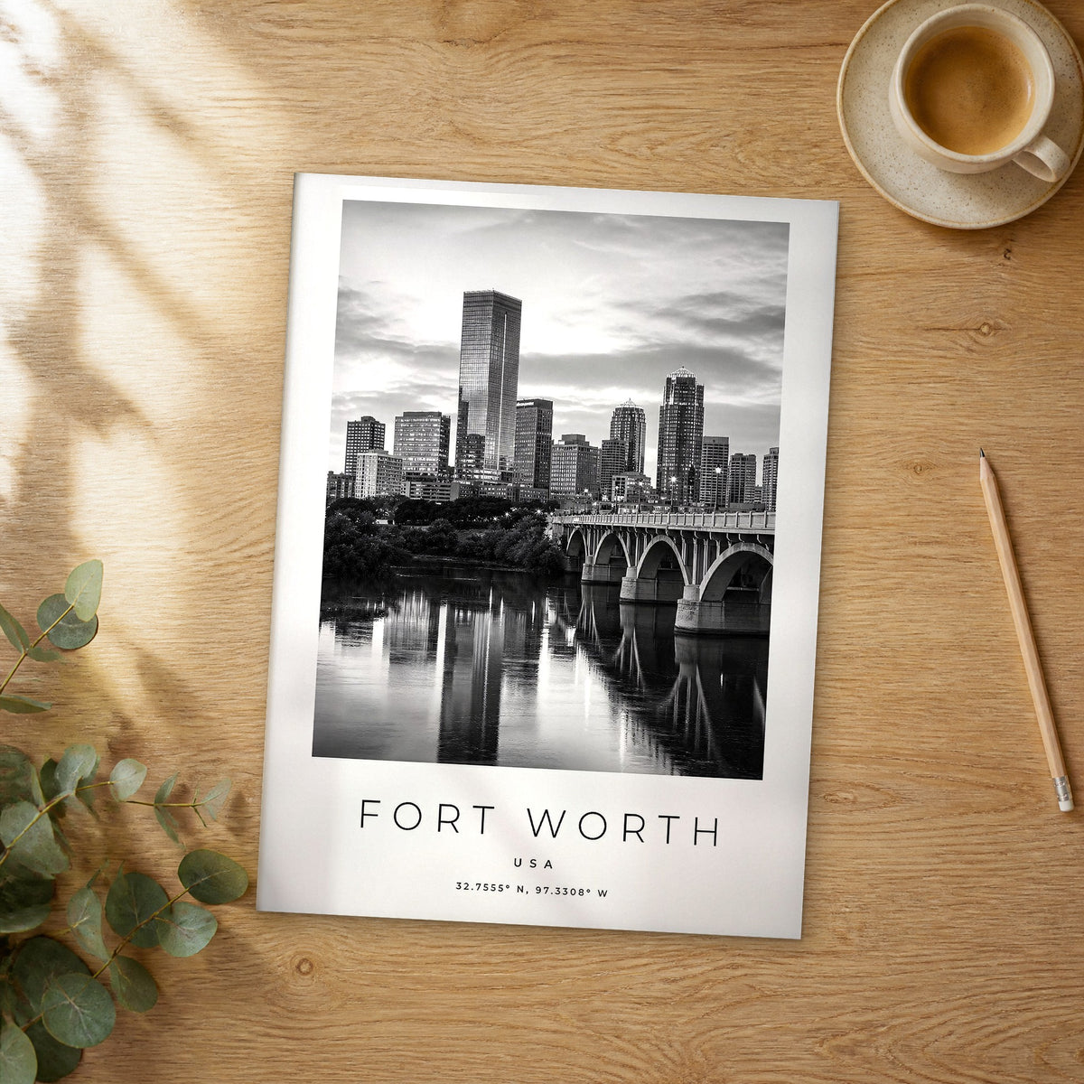 Unframed Fort Worth black and white travel poster on a wooden table