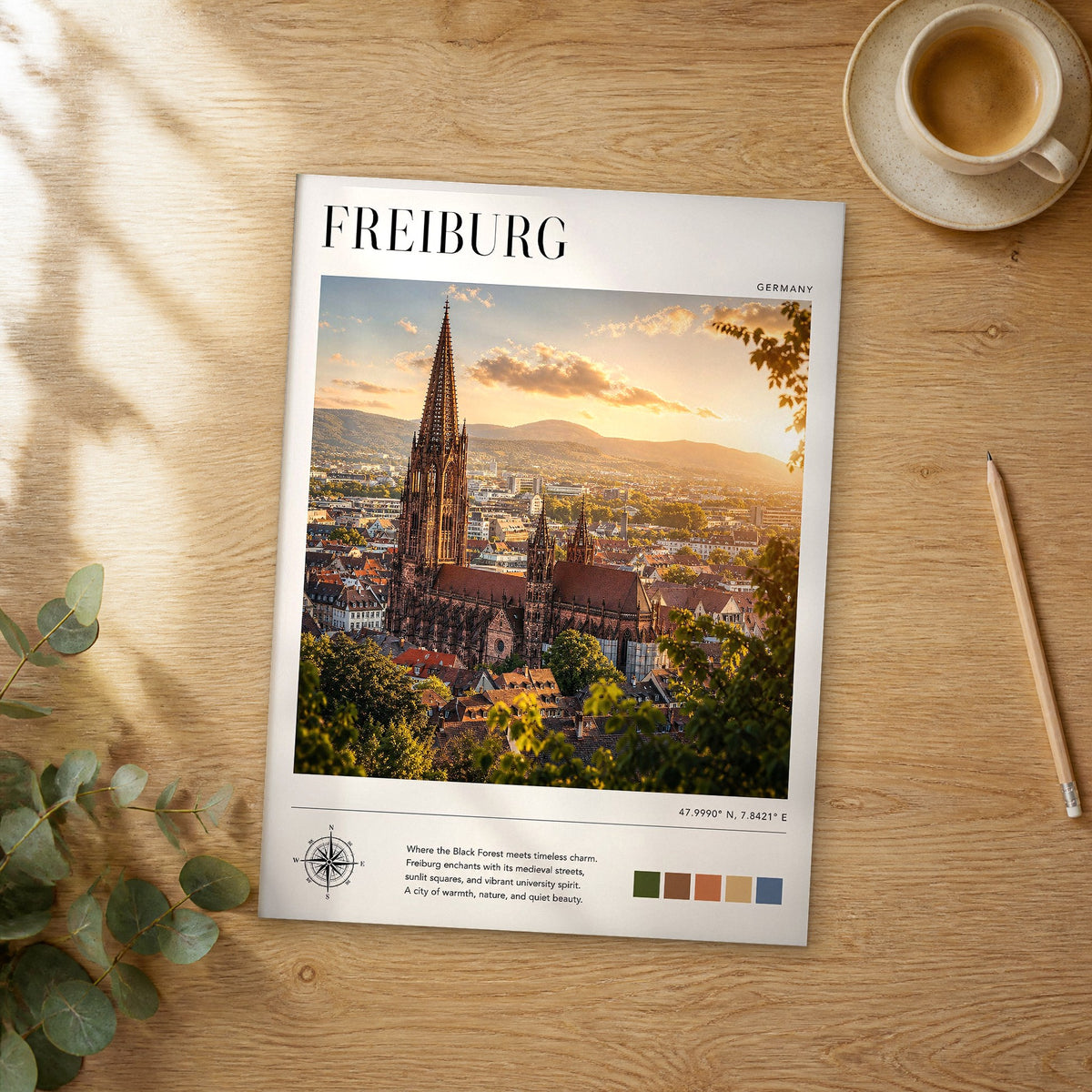 Unframed Freiburg modern photography travel poster on a wooden table
