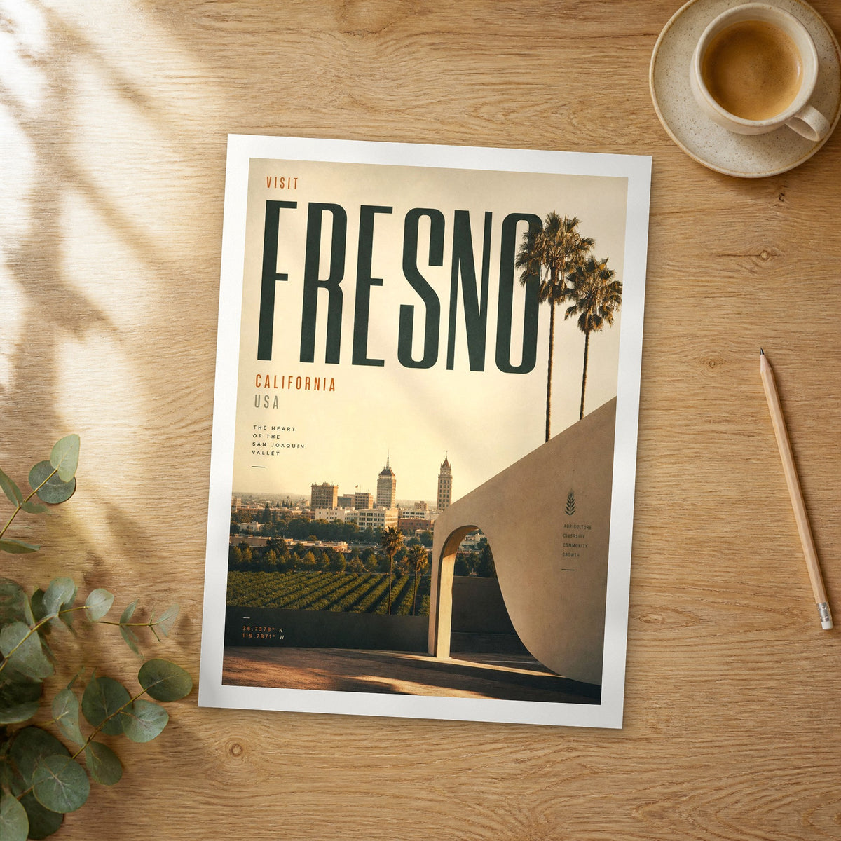 Unframed Fresno bold typography travel poster on a wooden table