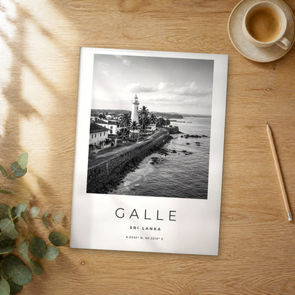 Unframed Galle black and white travel poster on a wooden table