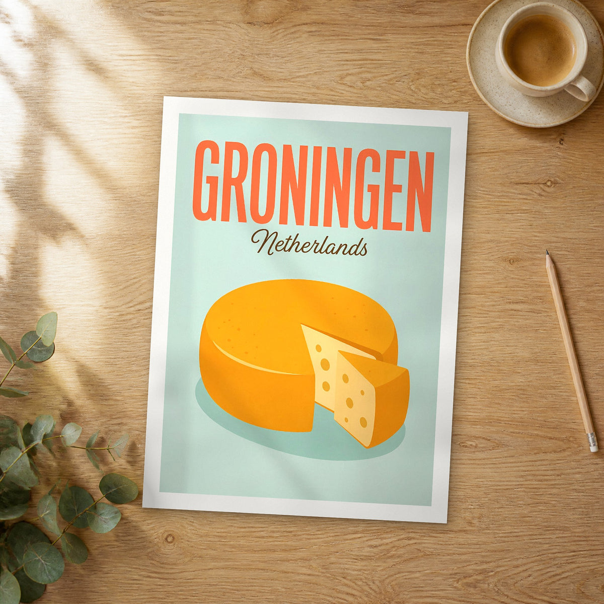 Unframed Groningen pop art travel poster on a wooden table