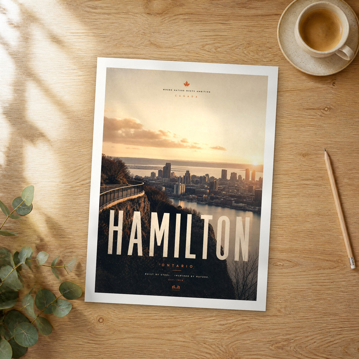Unframed Hamilton bold typography travel poster on a wooden table