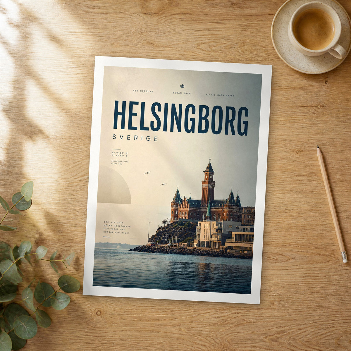 Unframed Helsingborg bold typography travel poster on a wooden table