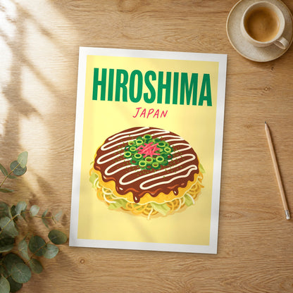 Unframed Hiroshima pop art travel poster on a wooden table