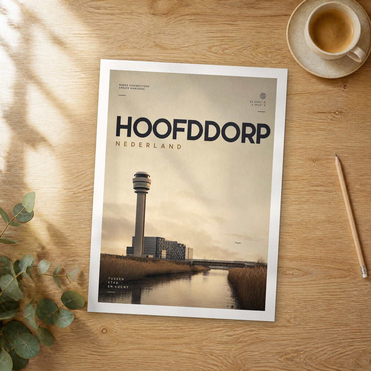Unframed Hoofddorp bold typography travel poster on a wooden table
