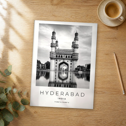 Unframed Hyderabad black and white travel poster on a wooden table