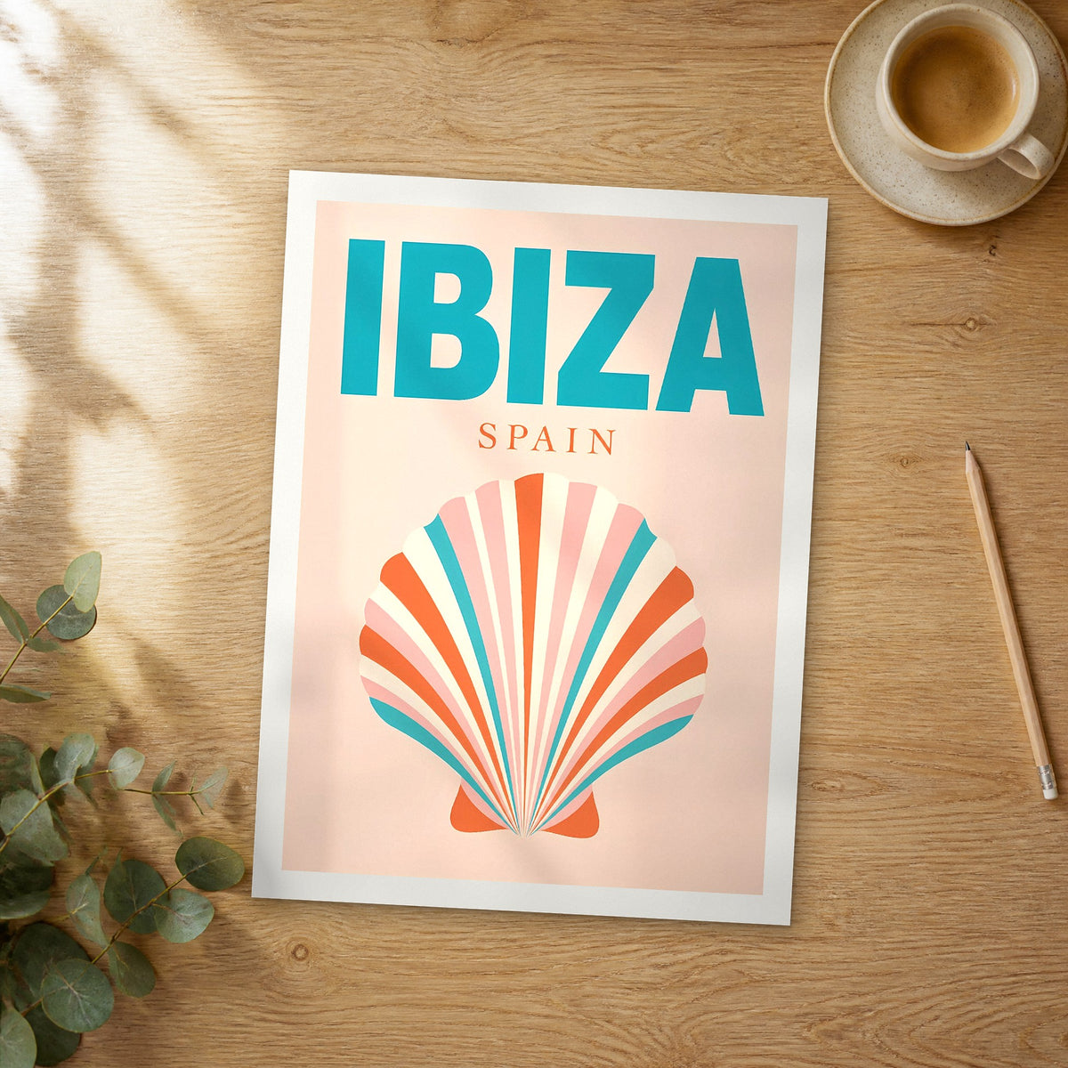 Unframed Ibiza pop art travel poster on a wooden table