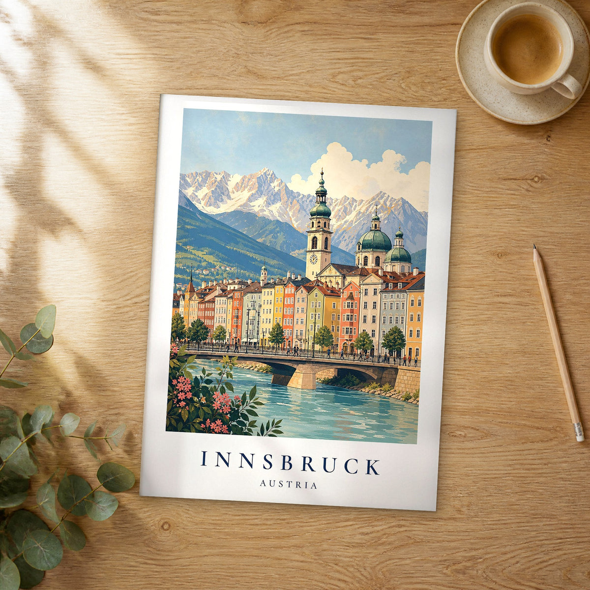 Unframed Innsbruck vintage travel poster on a wooden table