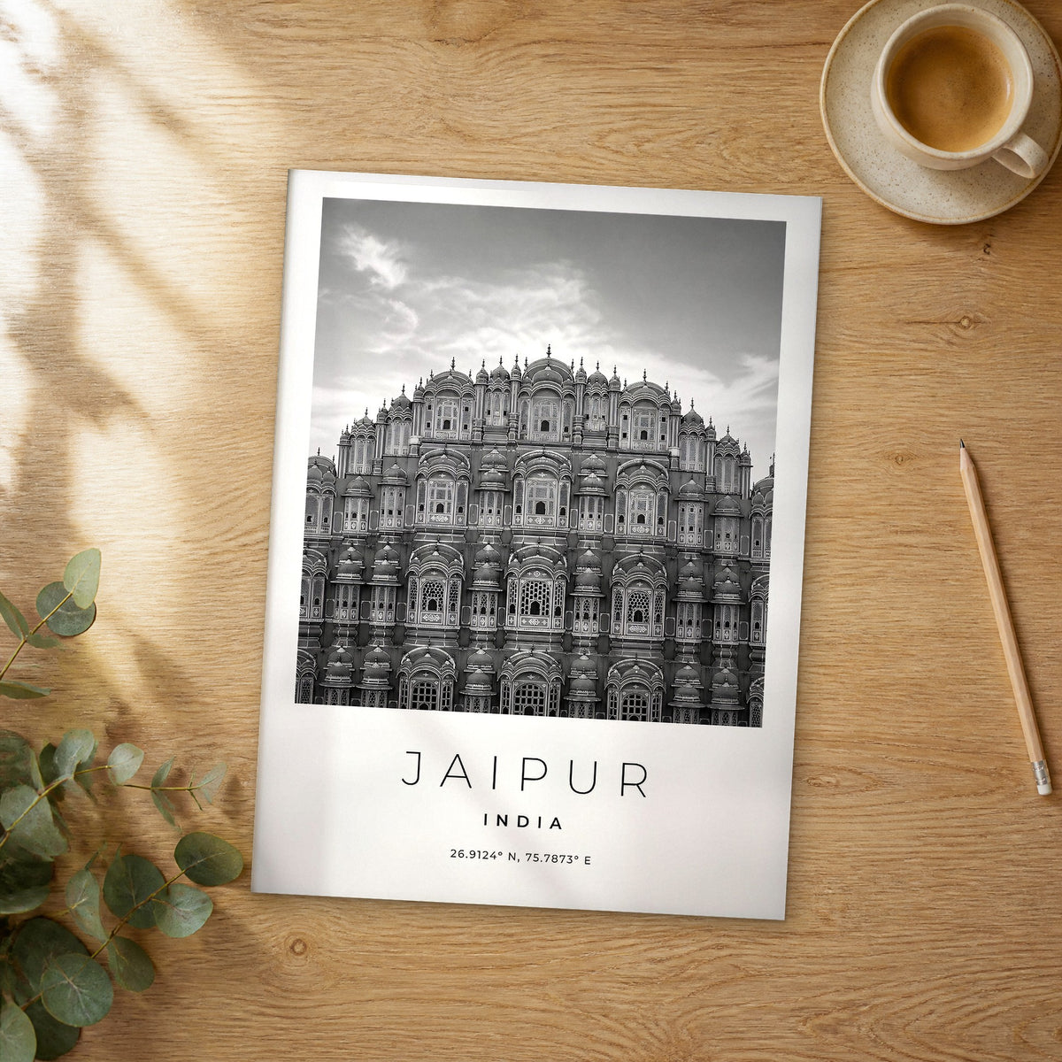 Unframed Jaipur black and white travel poster on a wooden table
