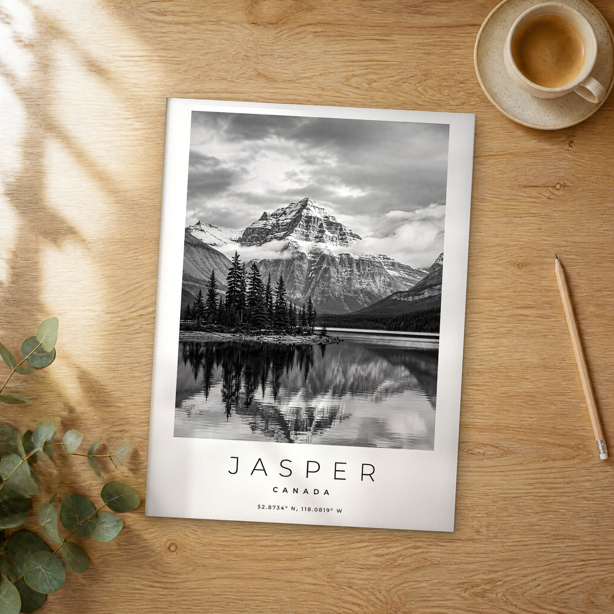 Unframed Jasper black and white travel poster on a wooden table