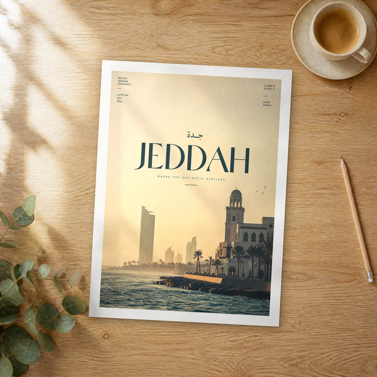 Unframed Jeddah bold typography travel poster on a wooden table