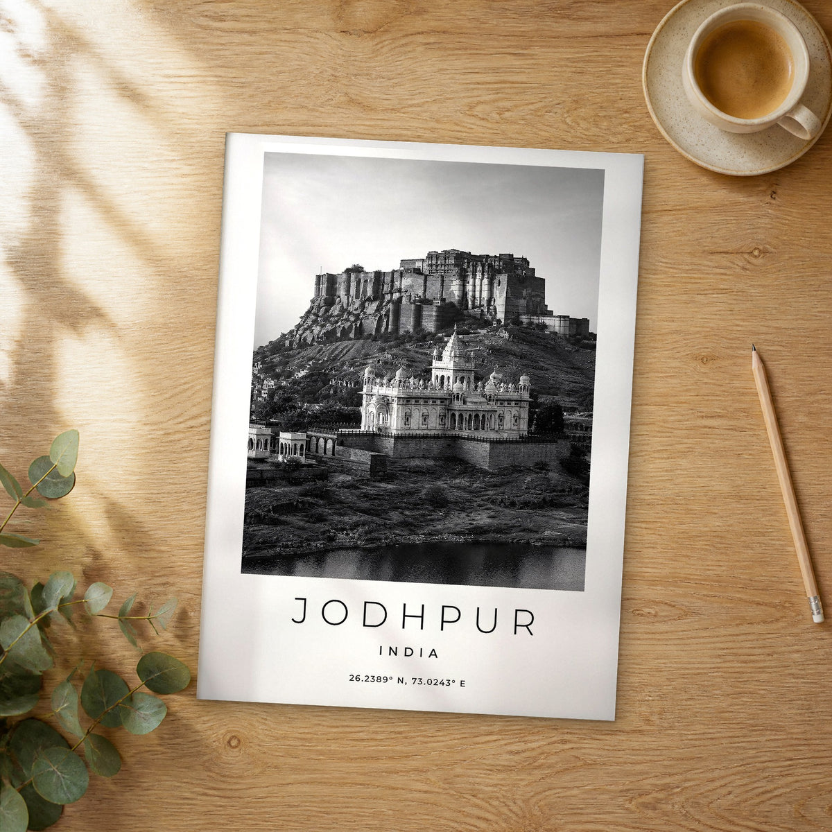 Unframed Jodhpur black and white travel poster on a wooden table