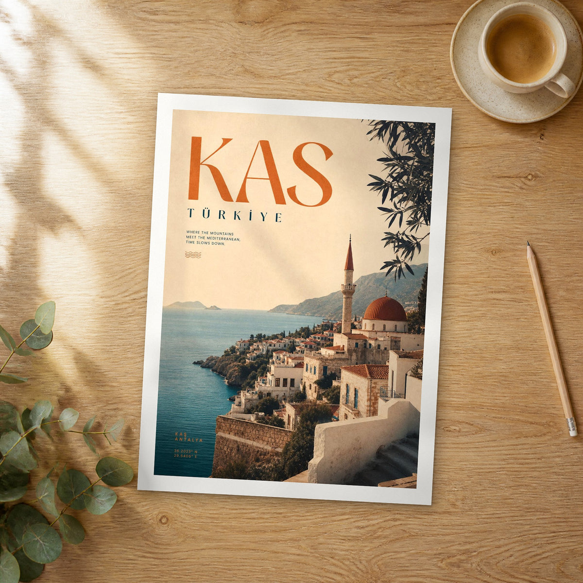 Unframed Kas bold typography travel poster on a wooden table