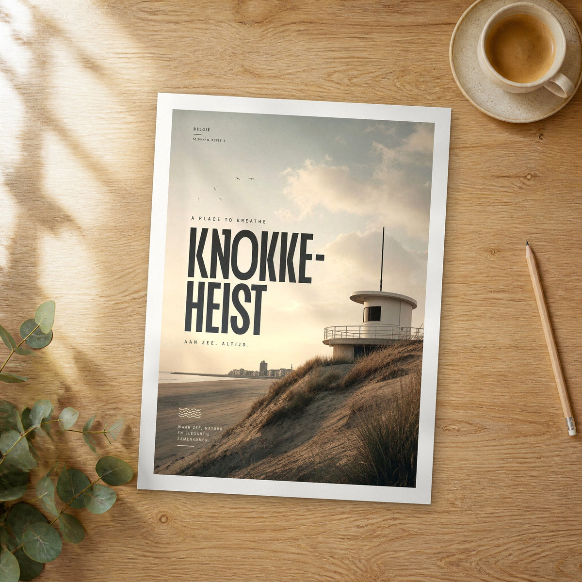 Unframed Knokke-Heist bold typography travel poster on a wooden table