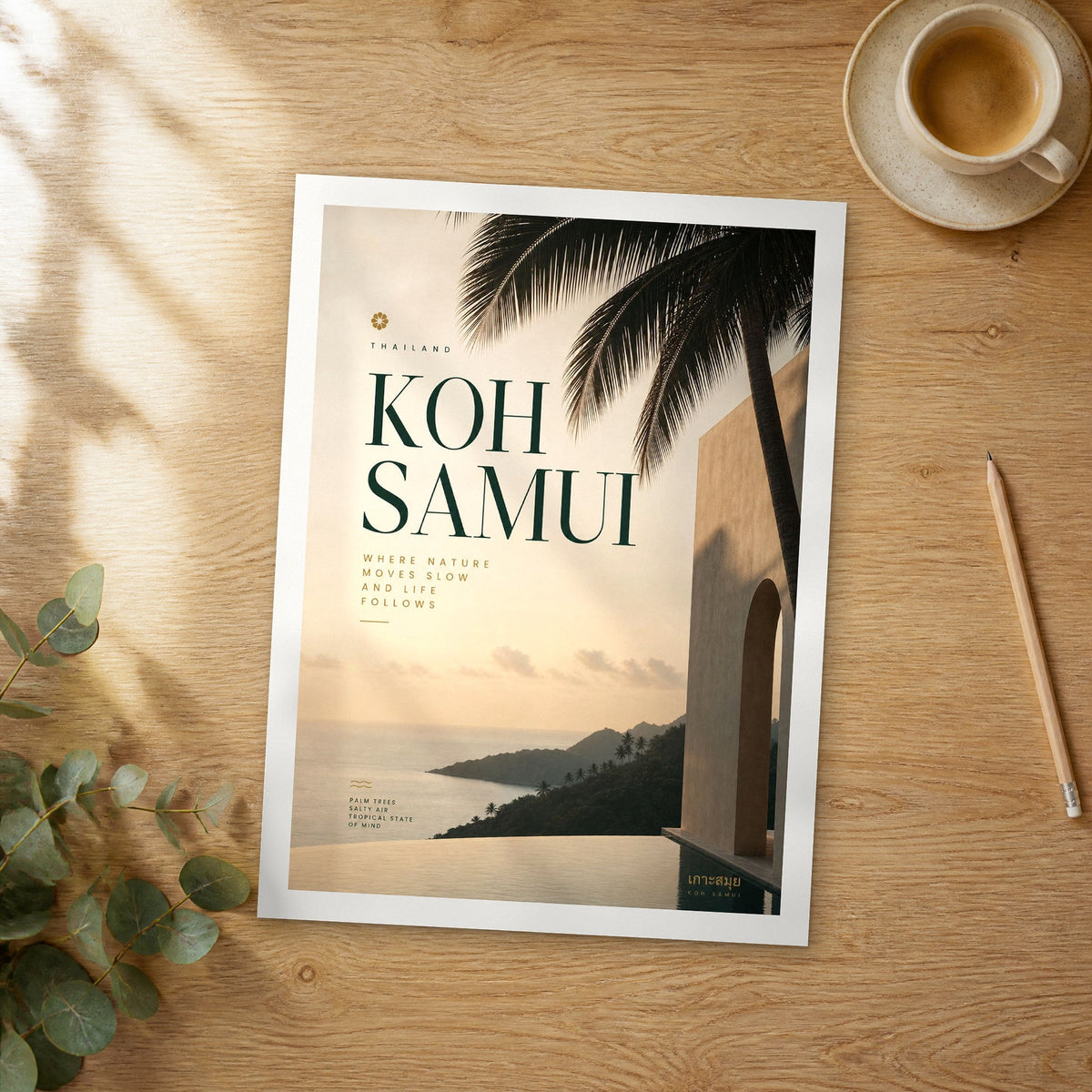 Unframed Koh Samui bold typography travel poster on a wooden table
