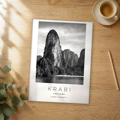 Unframed Krabi black and white travel poster on a wooden table