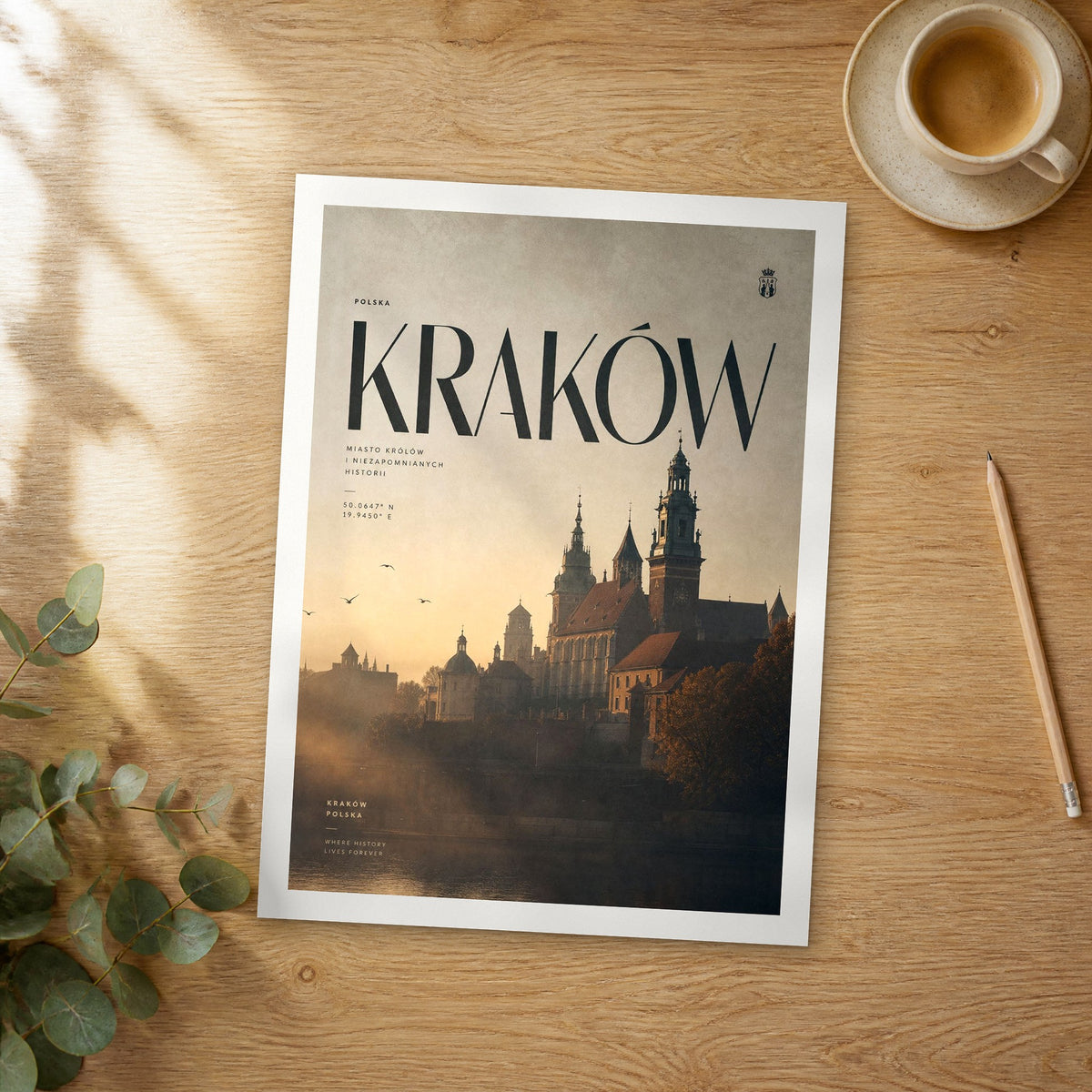 Unframed Kraków bold typography travel poster on a wooden table