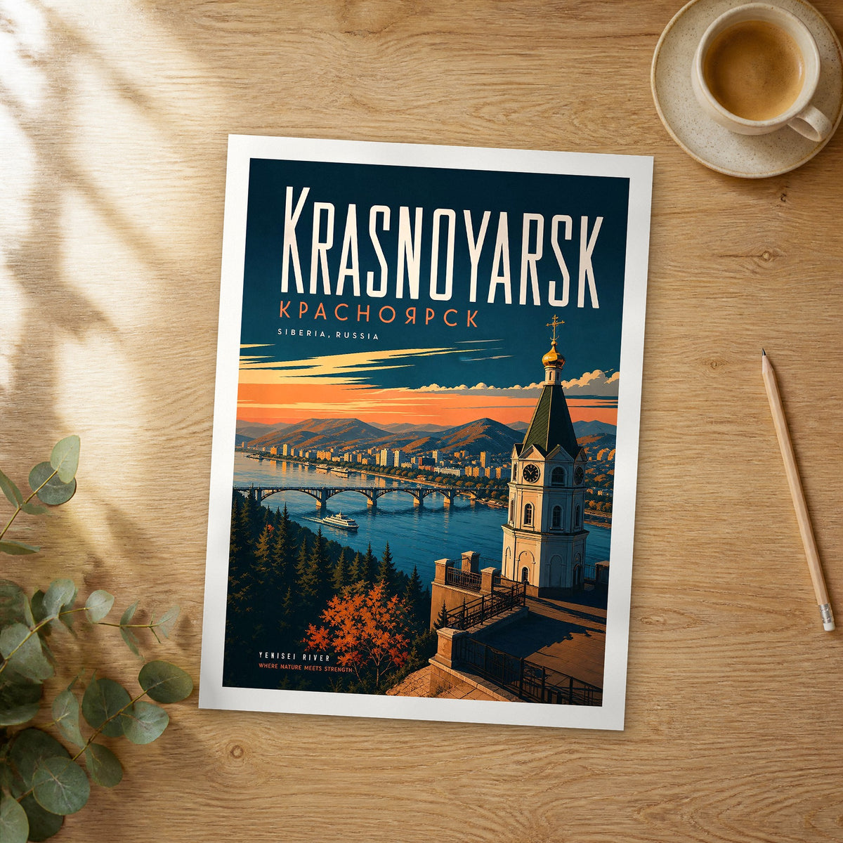 Unframed Krasnoyarsk retro travel poster on a wooden table