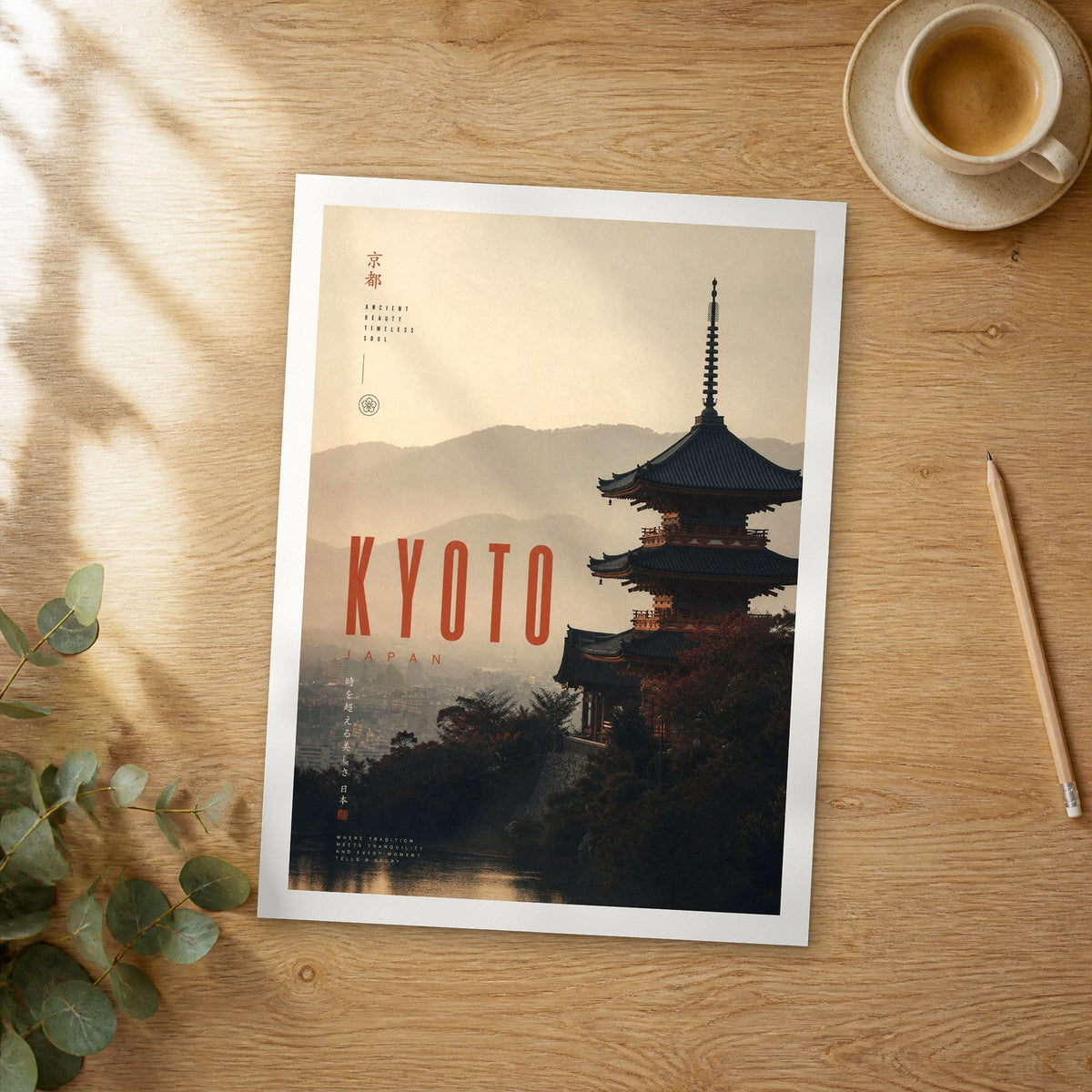 Unframed Kyoto bold typography travel poster on a wooden table