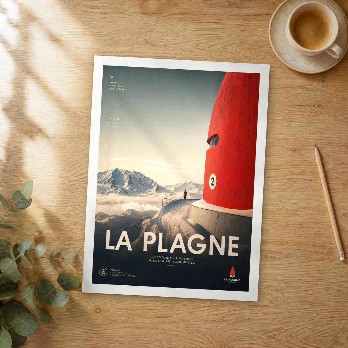 Unframed La Plagne bold typography travel poster on a wooden table