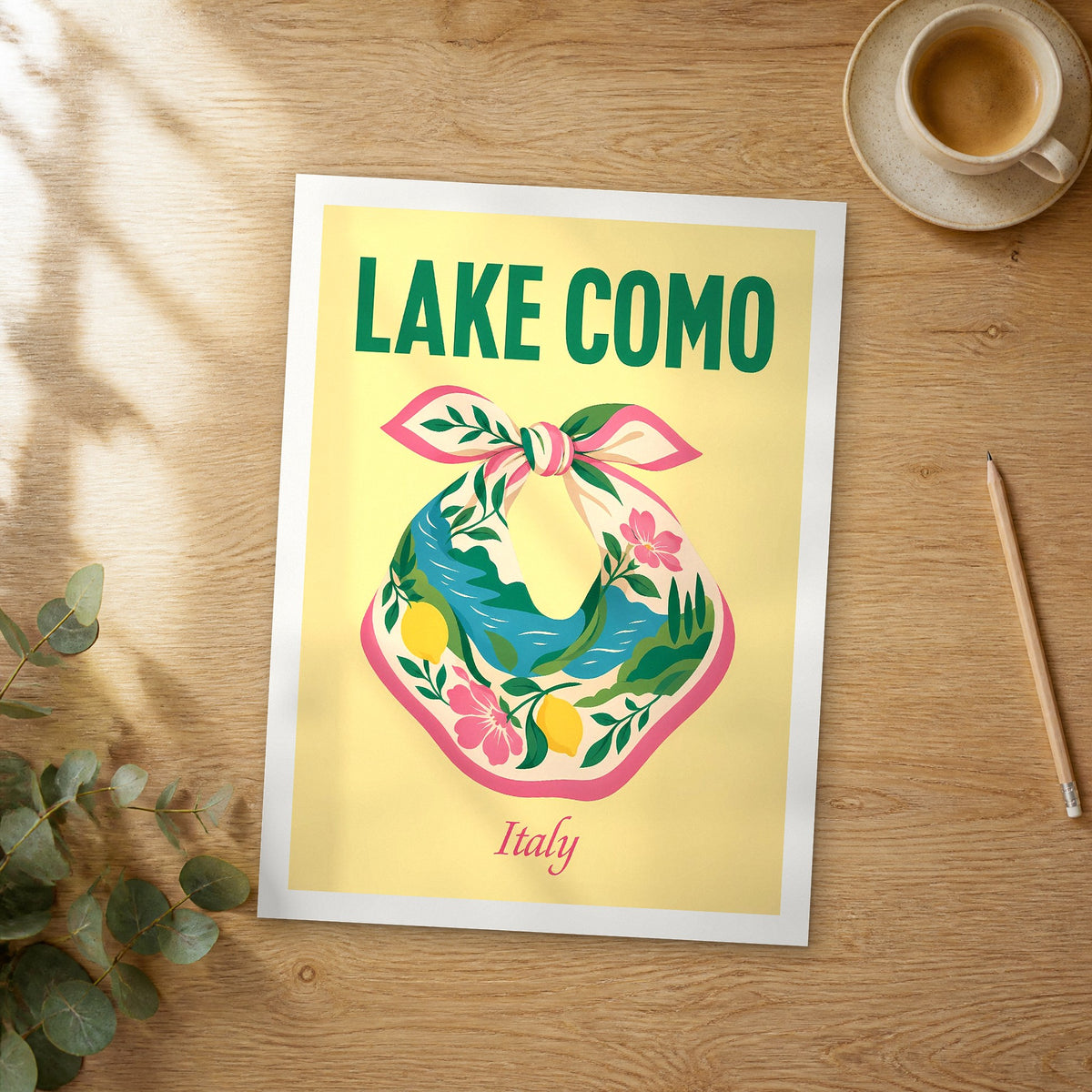 Unframed Lake Como pop art travel poster on a wooden table
