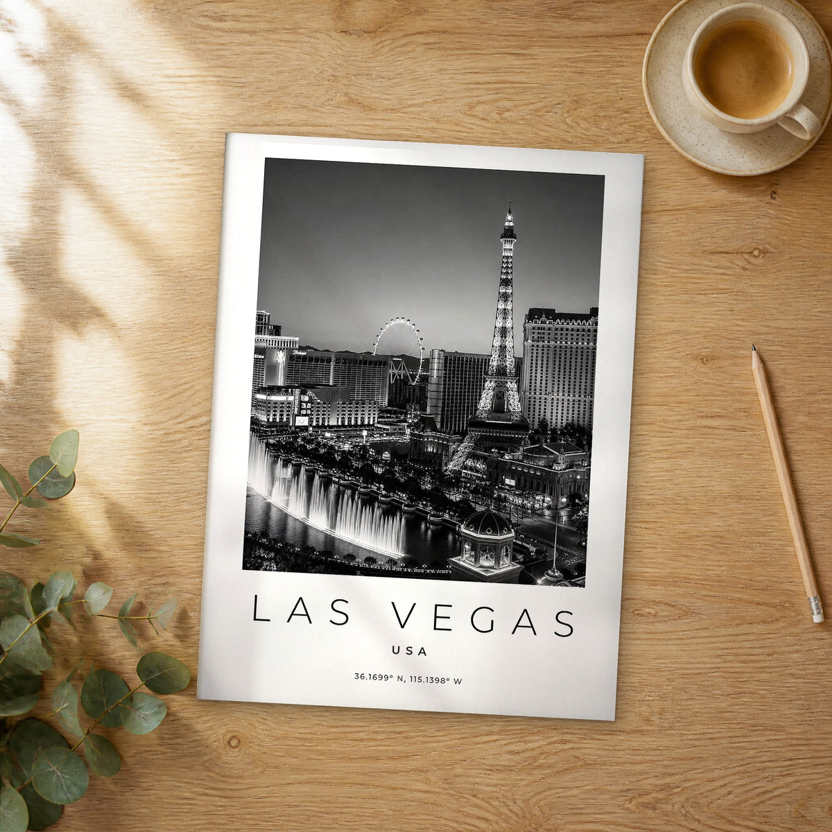 Unframed Las Vegas black and white travel poster on a wooden table