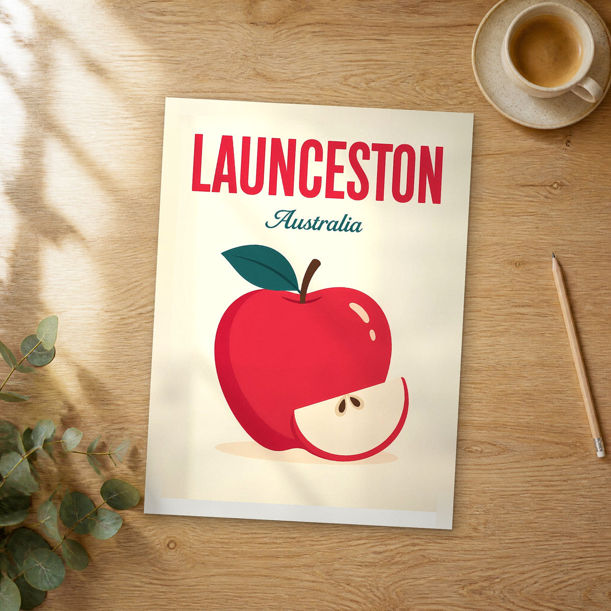 Unframed Launceston pop art travel poster on a wooden table