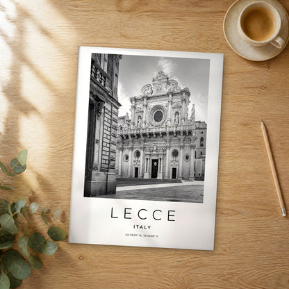 Unframed Lecce black and white travel poster on a wooden table