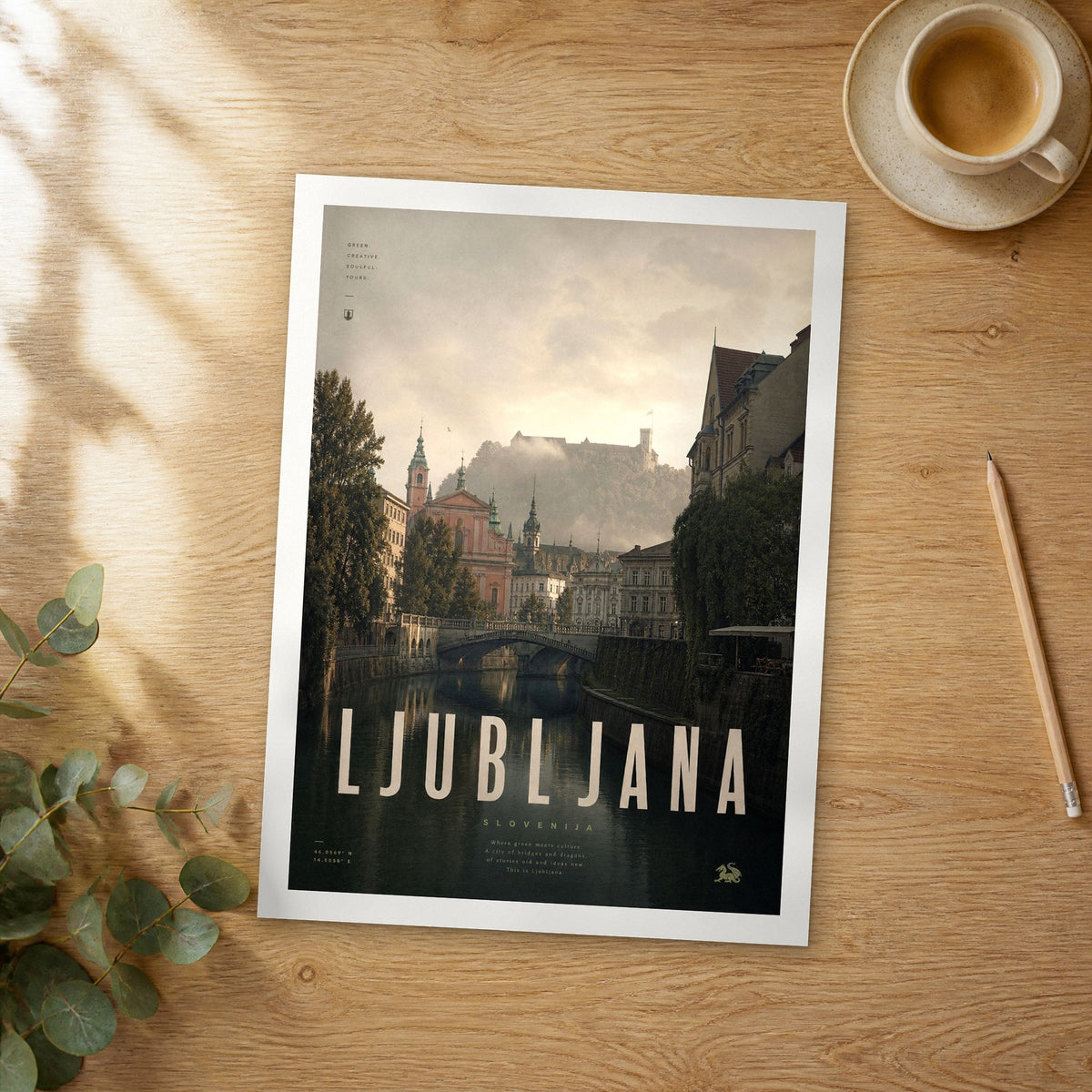 Unframed Ljubljana bold typography travel poster on a wooden table