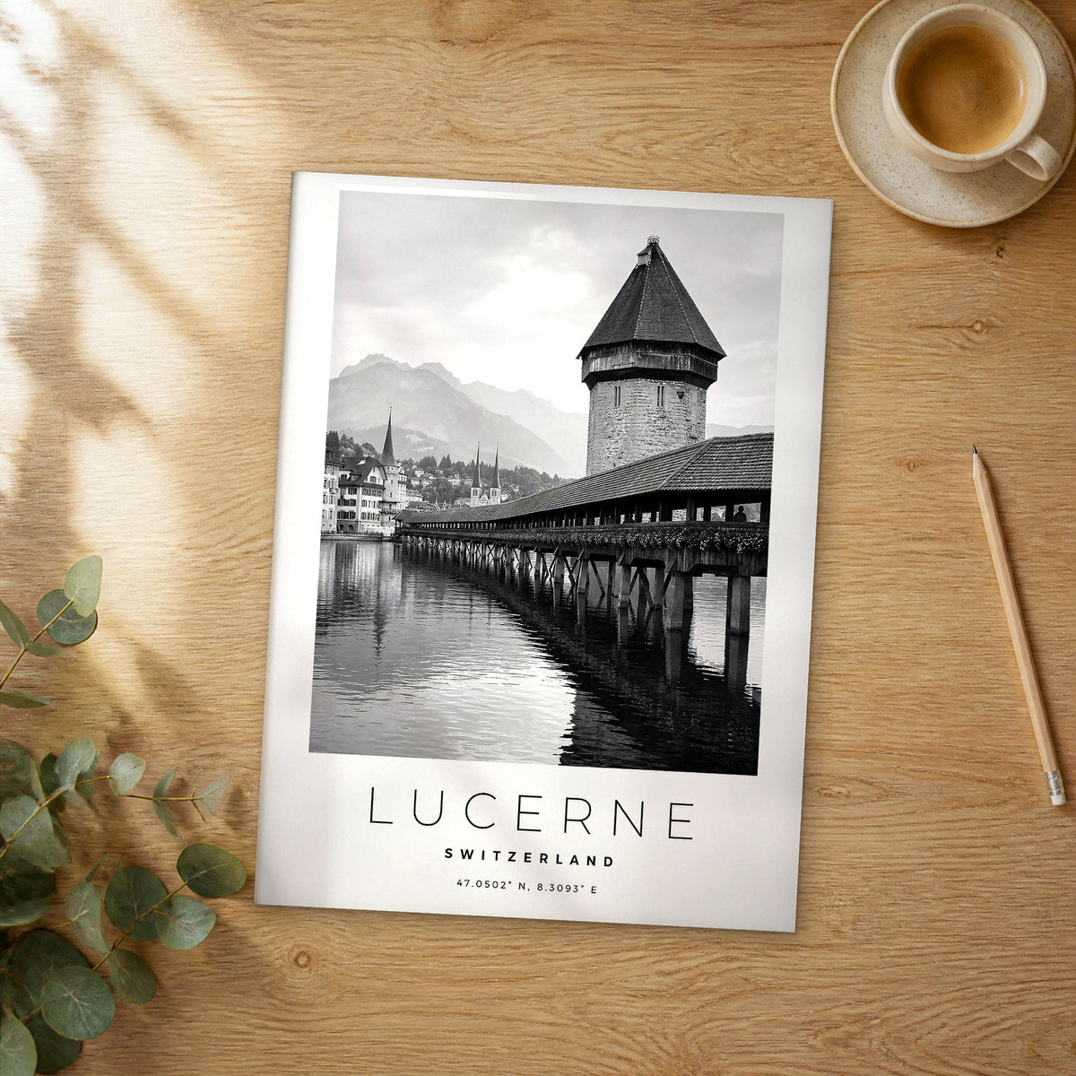 Unframed Lucerne black and white travel poster on a wooden table