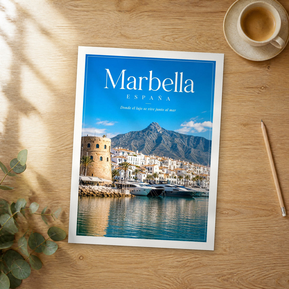 Unframed Marbella editorial travel poster on a wooden table